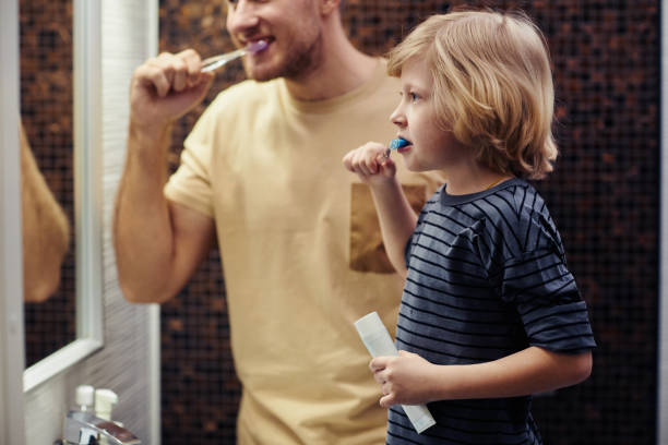 istock Young Father with Son Shaving 1408510237
