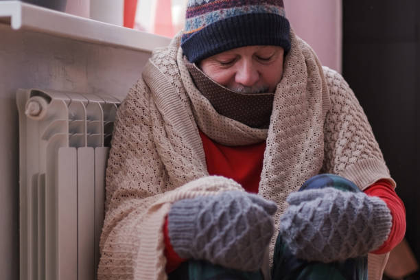 istock Man feeling cold at home with home heating trouble 1408510786