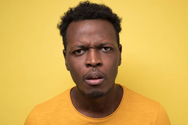 istock Young african man being skeptic and nervous, disapproving expression on fac 1408511467