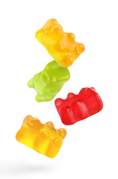 istock Flying delicious jelly gummy bears on white 1408512793