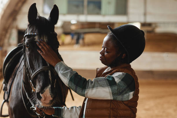 istock Caring Rider with Horse 1408512812