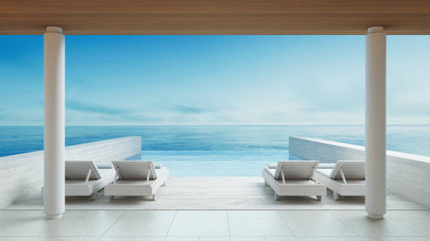 istock Luxury lounge chair on the beach sea - 3D rendering 1408513318