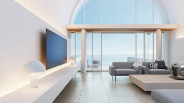 villa di lusso sulla spiaggia vista mare interni design moderno - rendering 3d - santorini greece villa beach foto e immagini stock