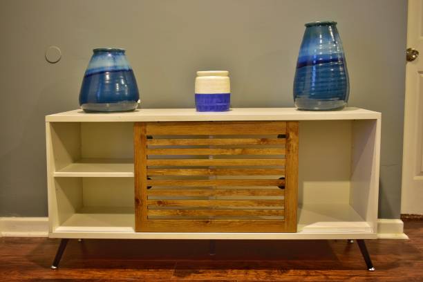 istock Wooden cabinet with ceramic pots 1408516226