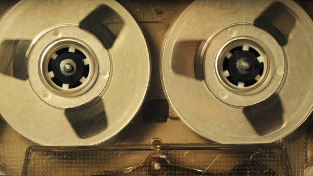 istock Cassette tape player, spool close up. 1408518178