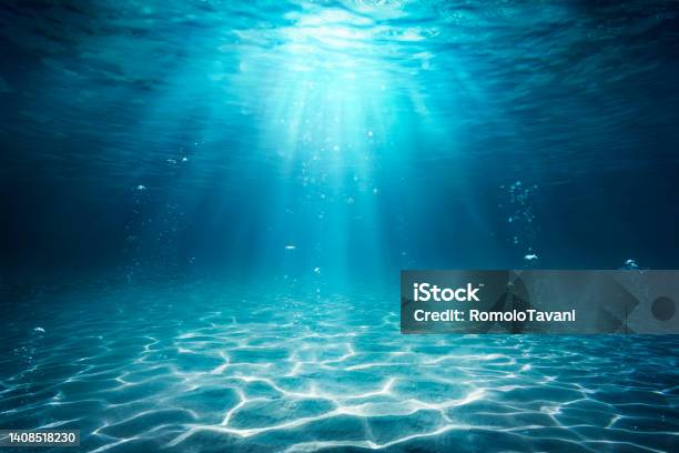 Underwater Sea Deep Water Abyss With Blue Sun Light Stock Photo - Download Image Now
