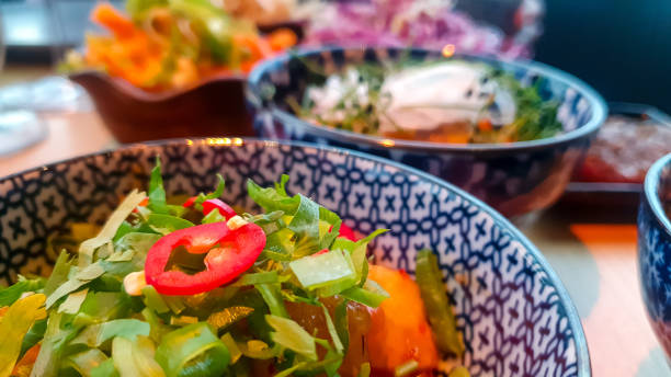 istock Colorful Korean food in blue and white patterned bowls 1408518310
