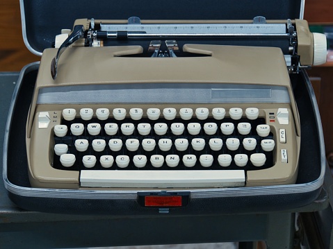 Retro Typewriter in Hard Case - Vintage journalist before computers