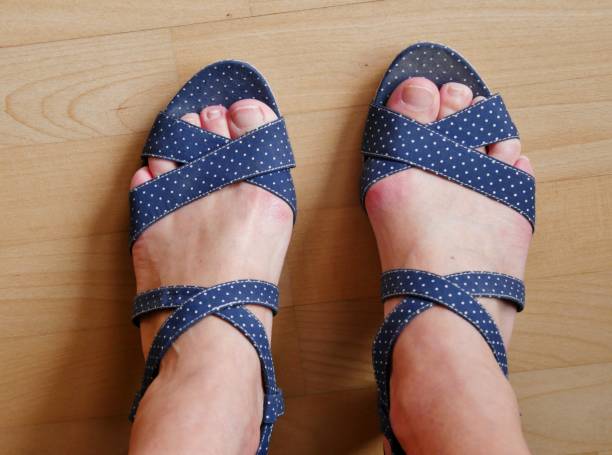 istock Strappy sandals with feet from above 1408522814
