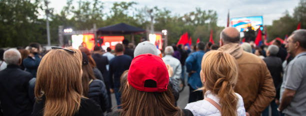 istock people in demonstration or a concert 1408525061