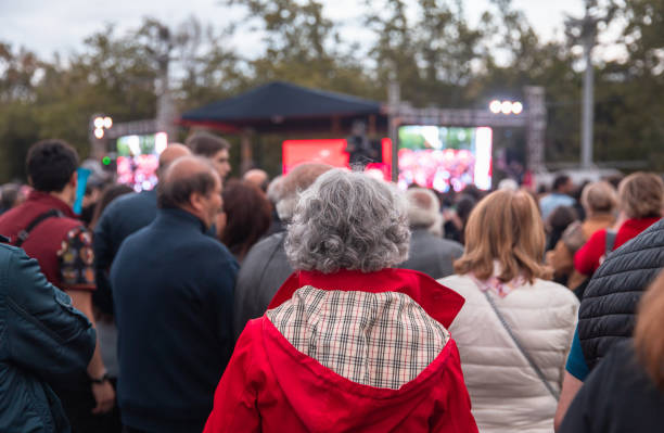 istock people in demonstration or a concert 1408525068