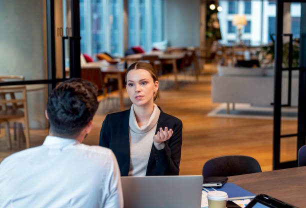 istock Two business people meeting in an office 1408526160