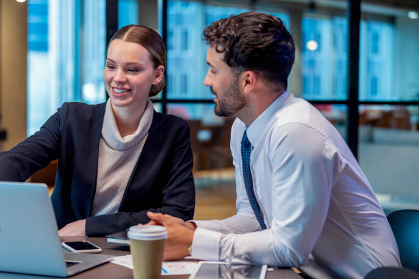 istock Two business people meeting in an office 1408526166