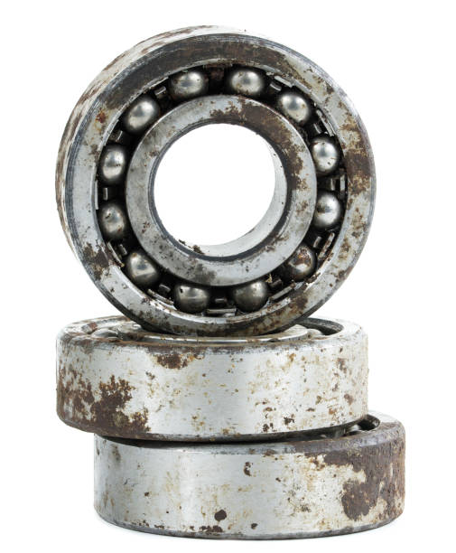 istock Bearing on a white background. Old worn bearing covered with rust 1408536972