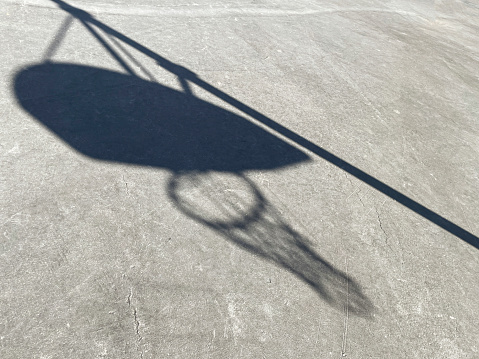 Shadow of hoop and backboard