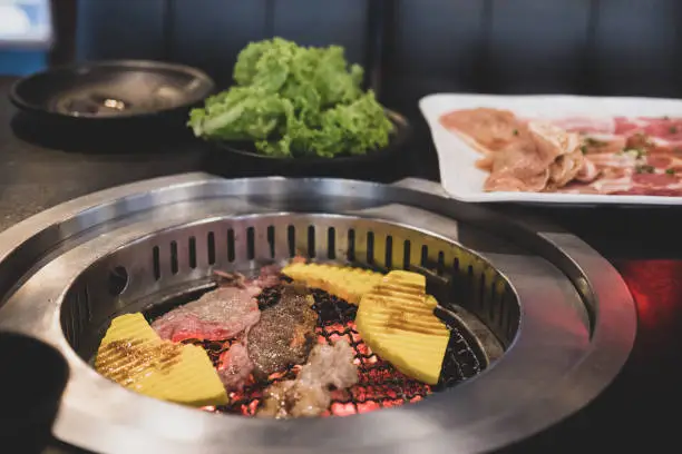 Real Yakiniku japanese grill style in japan.food that grille a thin sliced wagyu beef and dipped in a soy-bean sauce based sauce an rice.