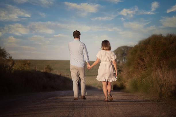 istock Couple expecting a child in beautiful landscape 1408542880