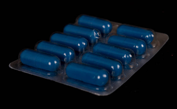 istock Close-up of blue pills 1408543538