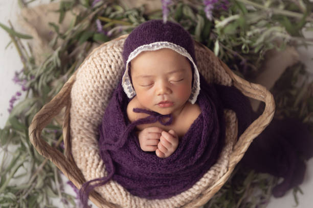 istock Newborn baby girl sleeping 1408543548