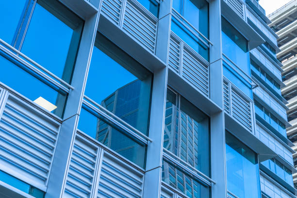 istock Urban abstract - windowed corner of office building 1408543783