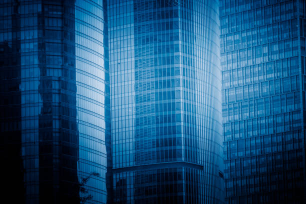 istock Urban abstract - windowed corner of office building 1408543822