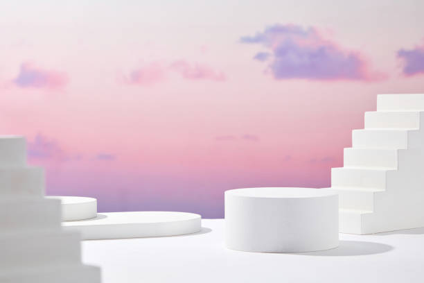 istock Front view of white podium and stairway with blank space in purple gradient cloudy sky background abstract content 1408547708