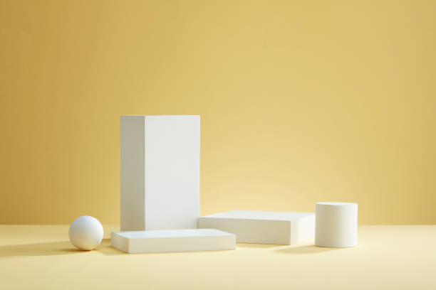 istock Front view of white podium with blank space in beige background abstract content 1408548356