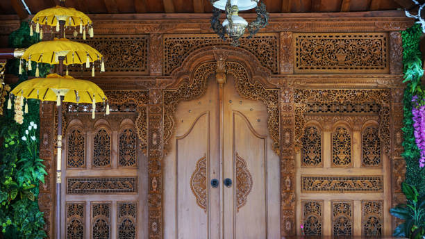 istock teak wood crafted backdrop,  Javanese backdrop usually used as wedding stage background decoration 1408555643