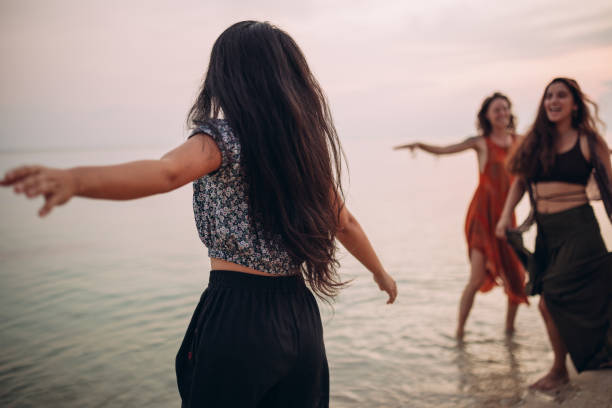 istock Friends on the beach party 1408557026