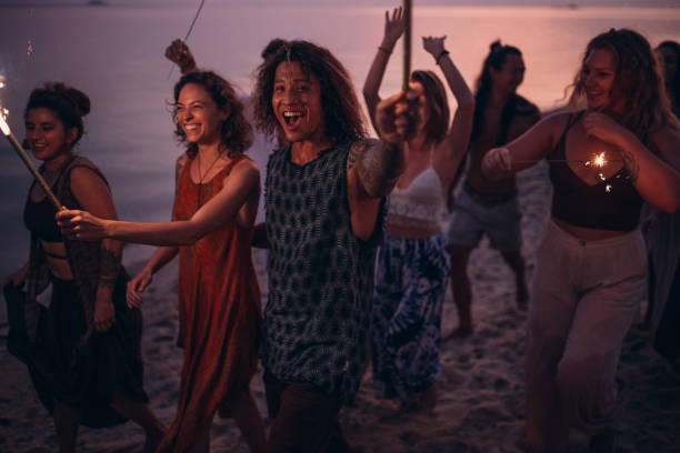 istock Friends on the beach party 1408557046