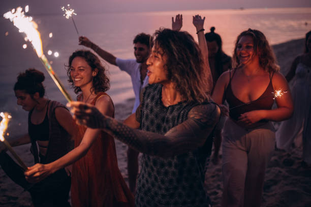istock Friends on the beach party 1408557049