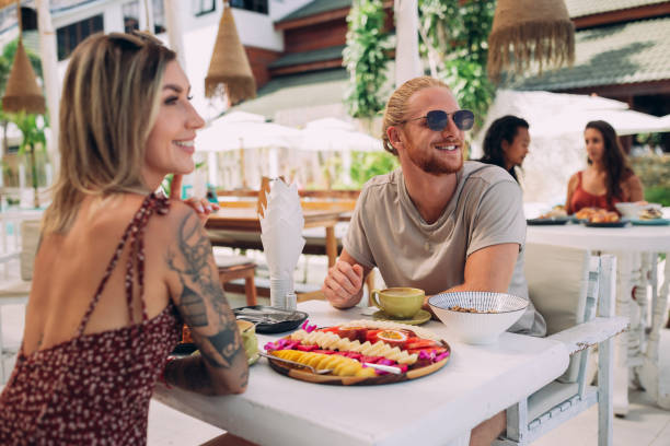 istock Couple enjoying breakfast together 1408557104