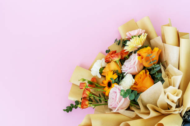 istock Mixed Flowers Bouquet With Copy Space on Pink Background 1408558966