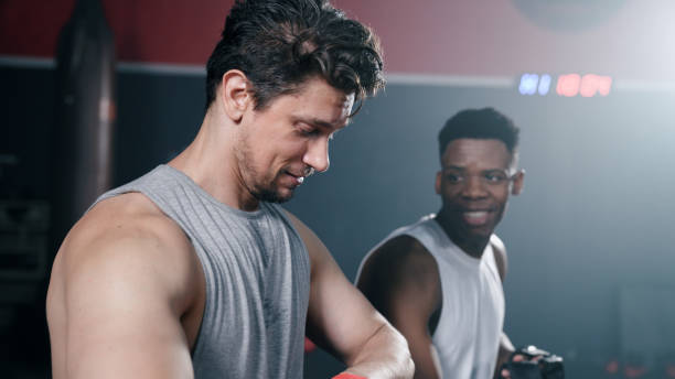 istock Asian Man Wrapping His Hand Before a Boxing Session. 1408559306