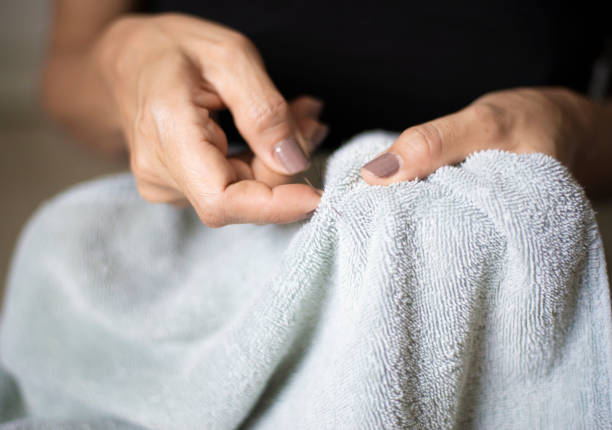 istock A picture of a woman's hand doing a sewing activity with traditional craftsmanship. 1408560355