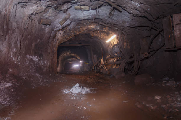 istock Dark tunnel in iron ore mine. 1408571435
