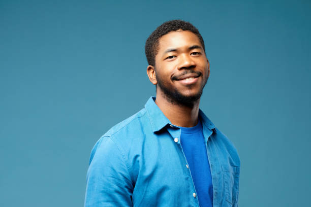 istock Black Man with AI Face on Blue 1408573687