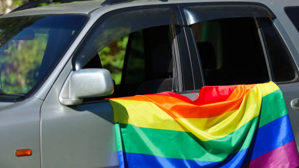istock Rainbow flag on car. LGBT concept. 1408573796