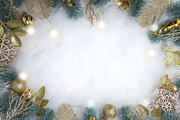 istock Frame made of Christmas decorations on snowy background with copy space 1408574939