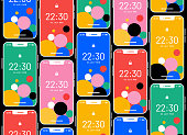 Vector background with colorful smartphones.