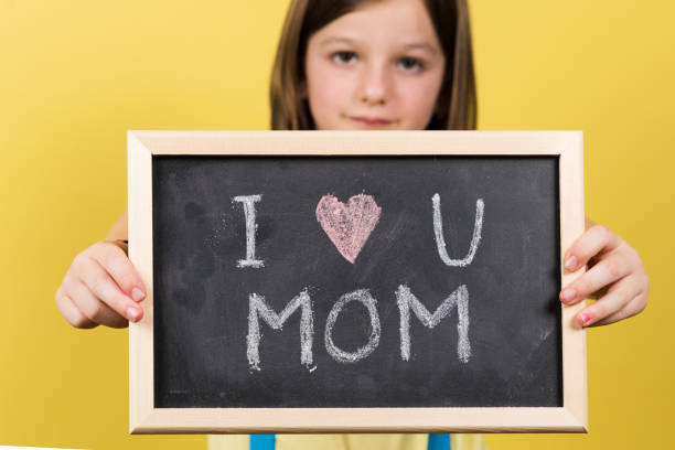 istock I love you mom message written on blackboard 1408579266