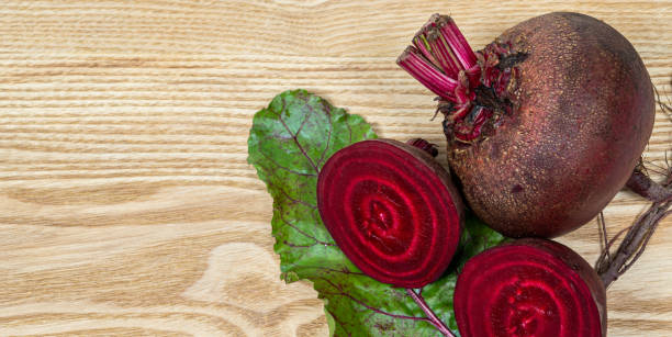 Fresh beets. Beets leaves and fresh beetroot. With copy space. stock photo
