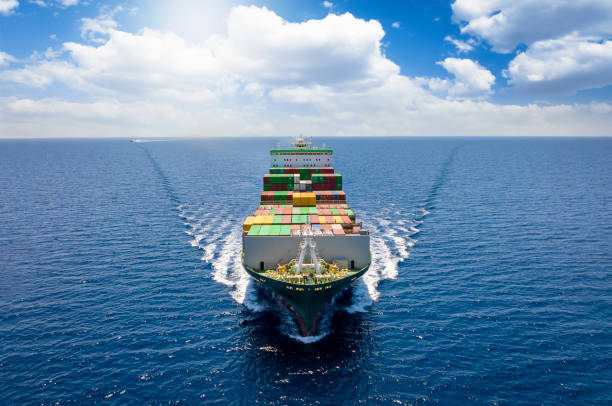 istock Aerial front view of a loaded container cargo vessel 1408586835
