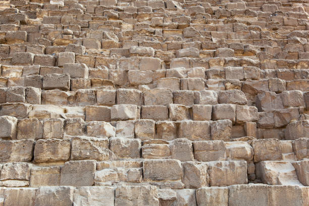 Pyramid detail Detail of the stonework of one of the Pyramids of Giza, Egypt. pyramid giza pyramids close up egypt stock pictures, royalty-free photos & images