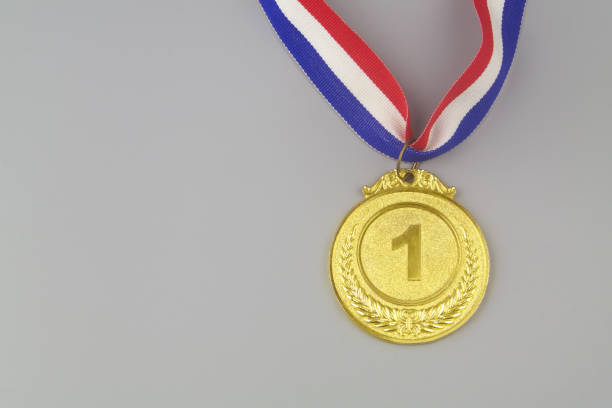 istock Gold medal with number 1 on gray background 1408589317