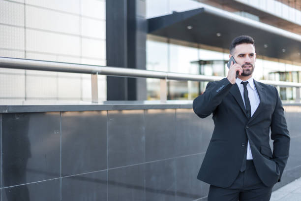 istock businessman using smartphone at street 1408590677