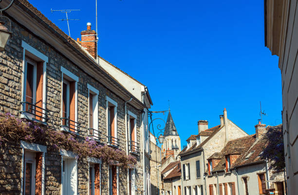 Street view of old village Milly-la-Foret in France Street view of old village Milly-la-Foret in France essonne stock pictures, royalty-free photos & images