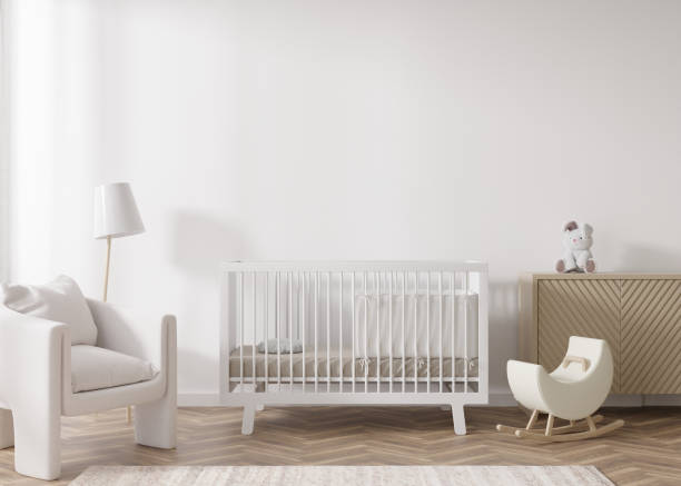 istock Empty white wall in modern child room. Mock up interior in scandinavian style. Copy space for your picture or poster. Bed, armchair, toys. Cozy room for kids. 3D rendering. 1408591212