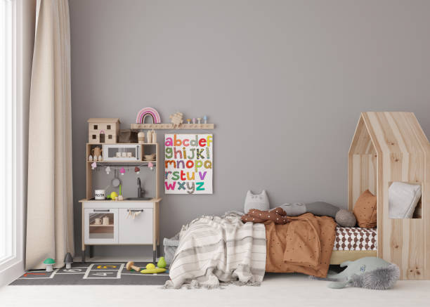 istock Empty gray wall in modern child room. Mock up interior in scandinavian style. Copy space for your picture or poster. Bed, toys. Cozy room for kids. 3D rendering. 1408591216