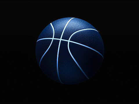 3D rendering of basketball ball against black background. Graphical element with abstract concept of sport equipment.